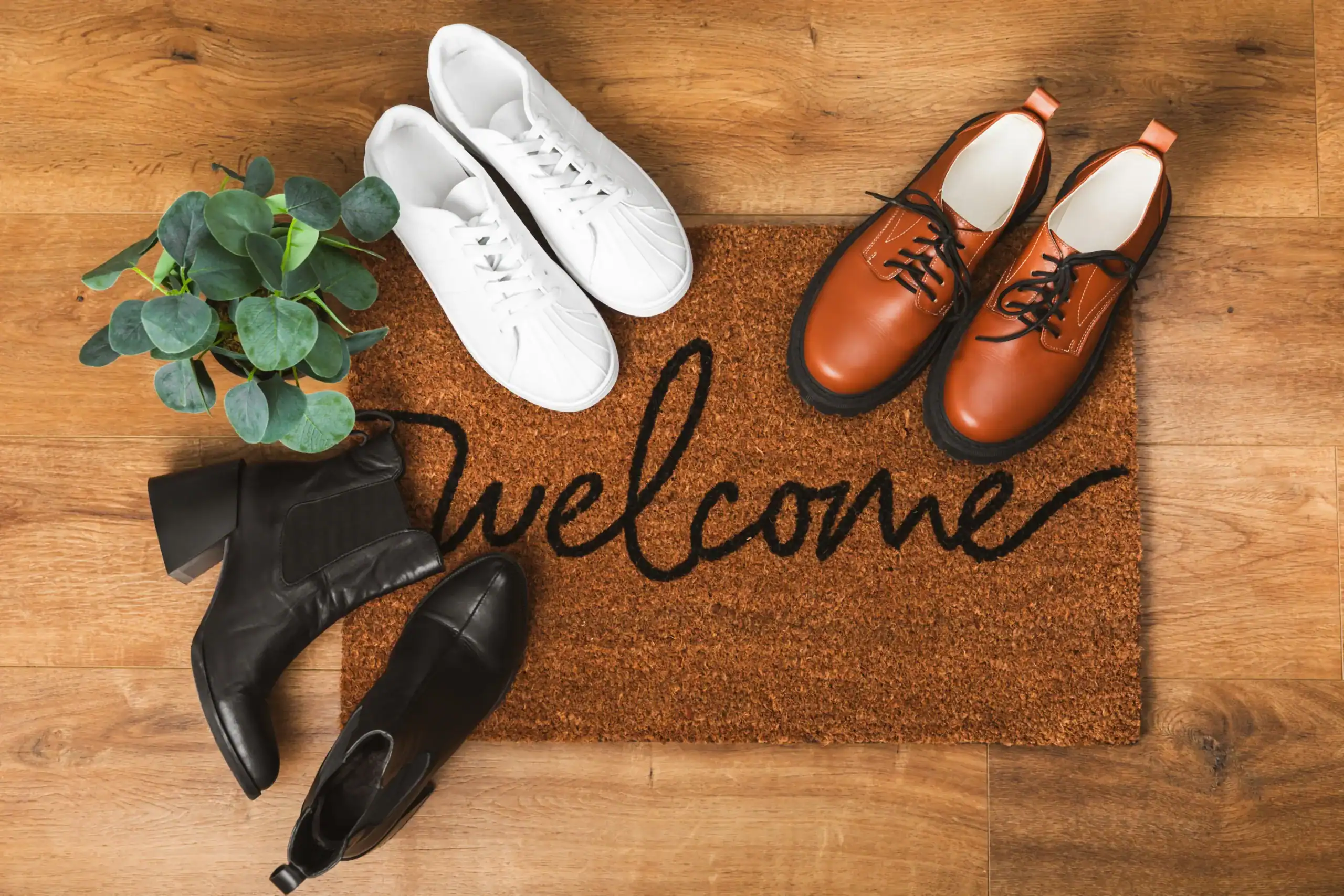 Shoemaker’s Insurance Shoes and Welcome Mat Shoes and welcome mat at Shoemaker's Insurance office entrance.